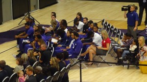 The K-State men's and women's basketball teams look on during the dedication of their practice facility.