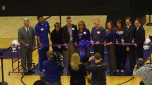 K-State dignitarites, donors, plus Rodney McGruder & Brittany Chambers take part in a ribbon cutting ceremony of the new basketball training facility.