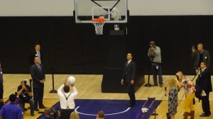 K-State president Kirk Schulz attempts a free throw in the new K-State basketball practice facility.