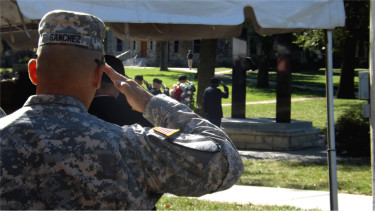 A Fort Riley solider salutes during Friday morning's 9/11 Commemoration Ceremony at Fort Riley. This is the second straight year no names were added to the memorial, which honors soldiers who've fallen in wars since that September day in 2001. (Staff photos by Brady Bauman)