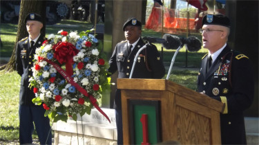 Maj. Gen. Wayne W. Grigsby, Jr. commanding general of Fort Riley, speaks to fellow soldiers and family members during Friday morning's 9/11 Commemoration Ceremony at Fort Riley. 