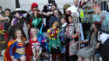 Costume contest participants pose for a group shot during the first-ever Little Apple Comic Con outside the Manhattan Conference Center Saturday afternoon. (Staff photos by Brady Bauman) 