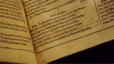 The famous lines "To be, or not to be..." in Shakespeare's "First Folio" displayed at KSU's Beach Museum of Art.