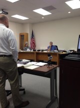 Public Works Director Peter Clark addressing County Commissioners (Pat Weixelman and Stan Hartwich pictured)