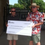 Konza Rotary Club President Rich Jankovich presents a $4,000.00 check to City of Enterprise Mayor Larry Jantz.