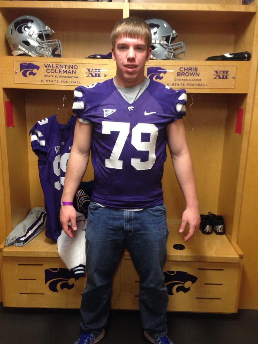 Holtoff poses in a K-State jersey during a visit in March. (Courtesy @aholtorf79)