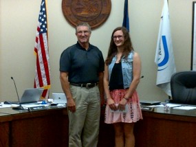 Kansas County Official of the Year-Dennis Peterson with scholarship winner-Emma Glessner