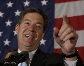 Kansas Gov. Sam Brownback makes his victory speech during a Republican watch party Tuesday, Nov. 4, 2014, in Topeka. (AP Photo/Charlie Riedel)