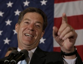 Kansas Gov. Sam Brownback makes his victory speech during a Republican watch party Tuesday, Nov. 4, 2014, in Topeka, Kan. (AP Photo/Charlie Riedel)