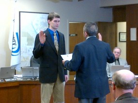 Ben Wilson, Riley County's newest commissioner, is sworn into office by County Clerk Rich Vargo in January. Wilson had questions concerning family planning and reproductive health services during budget talks in June.