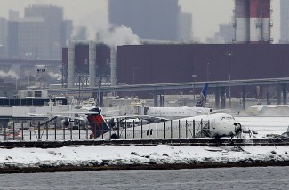 APTOPIX LaGuardia Plane Off Runway