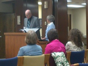 Commission Chair, Ron Wells presents County Health Department Director, Brenda Nickel with Health Week proclamation.