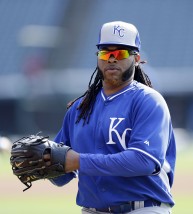 Kansas City Royals Johnny Cueto warms up before the Royals play the Cleveland Indians in a baseball game, Tuesday, July 28, 2015, in Cleveland. (AP Photo/Tony Dejak)