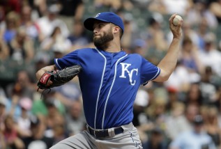 Kansas City Royals starter Danny Duffy throws against the Chicago White Sox during the first inning of a baseball game Sunday, July 19, 2015, in Chicago. (AP Photo/Nam Y. Huh)