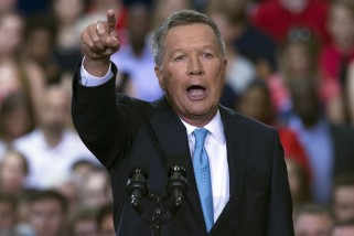 Ohio Gov. John Kasich announces he is running for the 2016 Republican partys nomination for president during a campaign rally at Ohio State University, Tuesday, July 21, 2015, in Columbus, Ohio. Kasich, a two-term governor and former congressman, has little name recognition in the crowded GOP field, but he is already airing television ads in New Hampshire where he is heading immediately after making his run official. (AP Photo/John Minchillo)