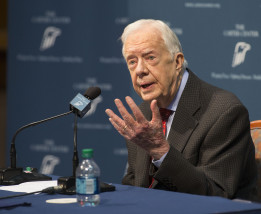 Former President Jimmy Carter talks about his cancer diagnosis during a news conference at The Carter Center in Atlanta on Thursday, Aug. 20, 2015. Carter announced that his cancer is on four small spots on his brain and he will immediately begin radiation treatment, saying he is "at ease with whatever comes." (AP Photo/Phil Skinner)