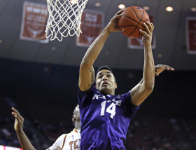 Kansas State guard Justin Edwards (14) rebounds the ball against Texas during the second half of an NCAA college basketball game, Saturday, March 7, 2015, in Austin, Texas.  (AP Photo/Michael Thomas)
