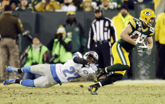 Green Bay Packers' Jordy Nelson gets past Detroit Lions' Glover Quin (27) after a catch during the second half of an NFL football game Sunday, Dec. 28, 2014, in Green Bay, Wis. (AP Photo/Jim Slosiarek)