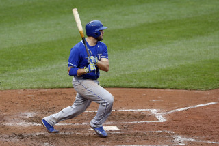 Kansas City Royals' Mike Moustakas singles in the sixth inning of a baseball game against the Baltimore Orioles, Saturday, Sept. 12, 2015, in Baltimore. Lorenzo Cain and Eric Hosmer scored on the play. (AP Photo/Patrick Semansky)