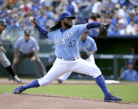 Kansas City Royals starting pitcher Johnny Cueto throws during the first inning of a baseball game against the Chicago White Sox, Sunday, Sept. 6, 2015, in Kansas City, Mo. (AP Photo/Charlie Riedel)
