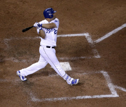 Kansas City Royals' Kendrys Morales hits a three-run home run during the fourth inning of a baseball game against the Detroit Tigers Wednesday, Sept. 2, 2015, in Kansas City, Mo. (AP Photo/Charlie Riedel)