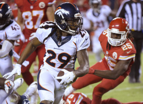 Denver Broncos cornerback Bradley Roby (29) runs for a touchdown after recovering a ball fumbled by Kansas City Chiefs running back Jamaal Charles (25) during the second half of an NFL football game in Kansas City, Mo., Thursday, Sept. 17, 2015. The Broncos won 31-24. (AP Photo/Ed Zurga)