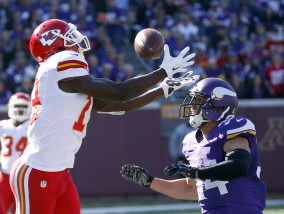 Kansas City Chiefs wide receiver Jeremy Maclin (19) catches a pass in front of Minnesota Vikings strong safety Andrew Sendejo (34) during the second half of an NFL football game, Sunday, Oct. 18, 2015, in Minneapolis. (AP Photo/Ann Heisenfelt)