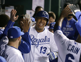 Kansas City Royals' Salvador Perez celebrates his home run during the fourth inning in Game 1 of baseball's American League Championship Series against the Toronto Blue Jays on Friday, Oct. 16, 2015, in Kansas City, Mo.  (AP Photo/Charlie Riedel)