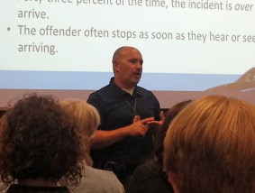 Sgt. Scott Hagenmeister of the Riley County Police Department speaks to county staff and employees about active violence and what to do if the unthinkable happens Monday during the county's in-service training day in the Farm Bureau building. 