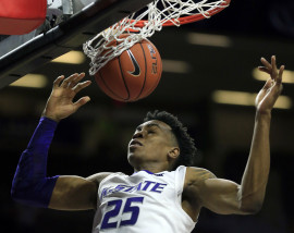Kansas State forward Wesley Iwundu (25) dunks during the second half of an NCAA college basketball game against Maryland Eastern Shore in Manhattan, Kan., Friday, Nov. 13, 2015. Kansas State defeated Maryland Eastern Shore 80-53. (AP Photo/Orlin Wagner)