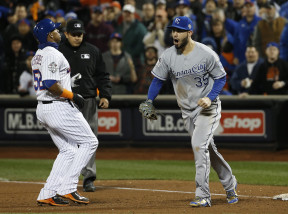 Kansas City Royals first baseman Eric Hosmer (35) celebrates after a double play ended the ninth inning of Game 4 of the Major League Baseball World Series Saturday, Oct. 31, 2015, in New York. The Royals won 5-3 to take a 3-1 lead in the series. Left is New York Mets' Yoenis Cespedes. (AP Photo/Matt Slocum)