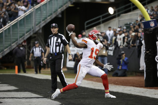 Kansas City Chiefs wide receiver Jeremy Maclin (19) celebrates after scoring on a touchdown run during the second half of an NFL football game against the Oakland Raiders in Oakland, Calif., Sunday, Dec. 6, 2015. (AP Photo/Marcio Jose Sanchez)