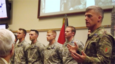 Maj. Gen. Wayne W. Grigsby honors soldiers during his presentation to local leaders and media Friday afternoon at Fort Riley. 