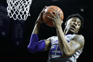 Kansas State's Wesley Iwundu gets a rebound during the first half of an NCAA college basketball game against Iowa State Saturday, Jan. 16, 2016, in Manhattan, Kan. (AP Photo/Charlie Riedel)