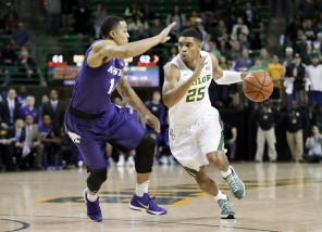 Kansas State guard Justin Edwards (14) defends as Baylor's Al Freeman (25) handles the ball during an NCAA college basketball game, Wednesday, Jan. 20, 2016, in Waco, Texas. (AP Photo/Tony Gutierrez)