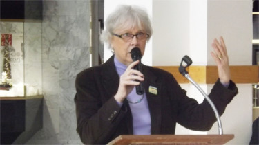 Manhattan Mayor Karen McCulloh addresses the crowd Monday in the Manhattan Town Center for the 32nd Annual Dr. Martin Luther King Jr. Celebration. 