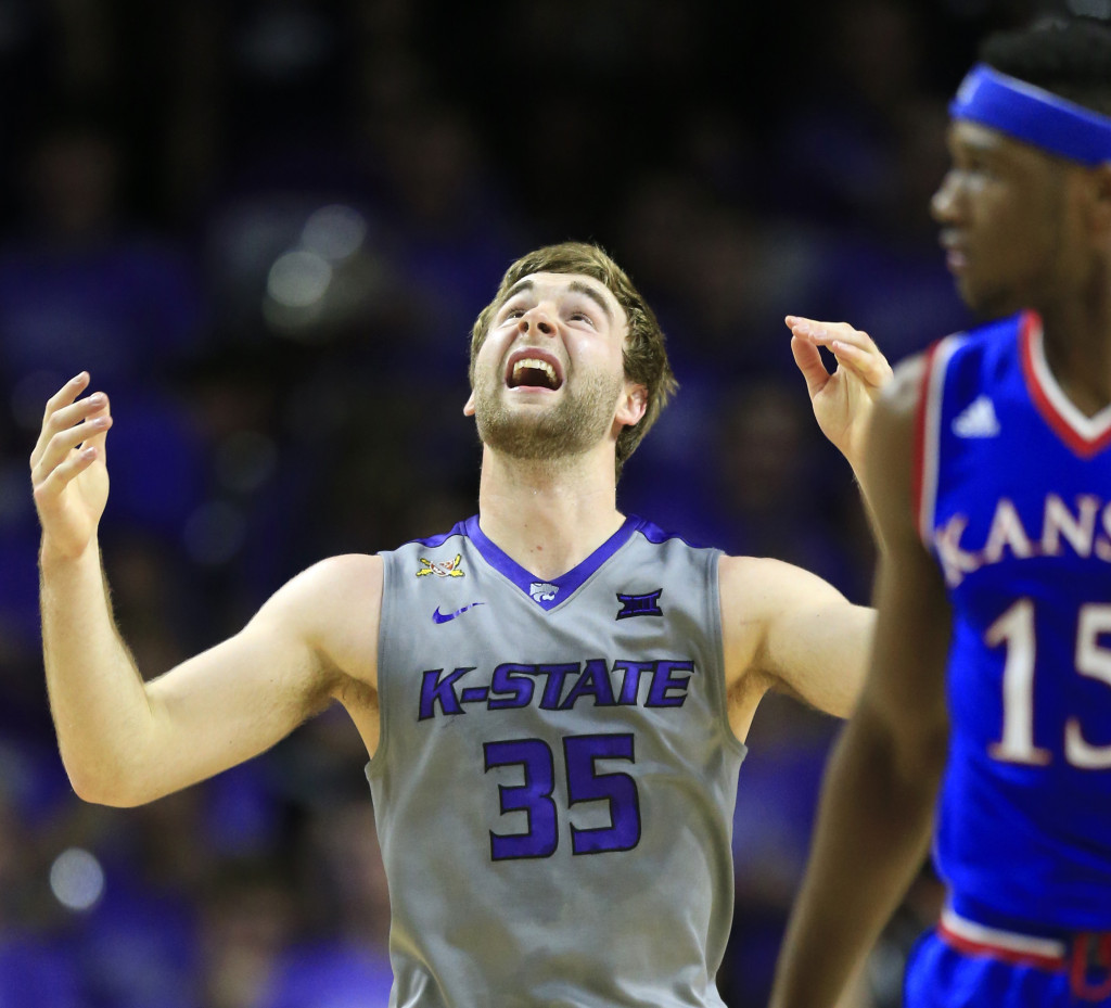 Kansas State forward Austin Budke (35) reacts after committing a foul during the first half of an NCAA college basketball game against Kansas in Manhattan, Kan., Saturday, Feb. 20, 2016. (AP Photo/Orlin Wagner)
