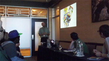 K-State professor Joe Sutliff Sanders speaks to the audience during a panelist discussion titled, “Keeping It (Mostly) Real: Building a Life of the Mind that Includes Comics.” He was joined by fellow KSU professors Traci Brimhall and Michele Janette.