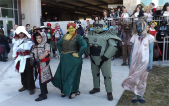 Winners of the Manhattan's first Little Apple Comic Con pose outside the Manhattan Conference Center Saturday afternoon.