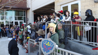 Costume costume participants gather for a group photo. 