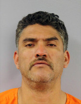 This handout photo provided by the Montgomery County Jail shows Pablo Serrano-Vitorino. The Mexican national suspected of killing his neighbor and three other men at his neighbor's Kansas home before killing another man about 170 miles away in Missouri was arrested early Wednesday, March 9, 2016, authorities said. (Montgomery County Jail via AP)