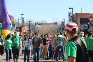 Fake Patty's Day goers enjoy the sunny weather in Aggieville Saturday. (Staff photo by Dan Smith)