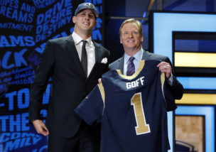 Californias Jared Goff poses for photos with NFL commissioner Roger Goodell after being selected by the Los Angeles Rams as the first pick in the first round of the 2016 NFL football draft, Thursday, April 28, 2016, in Chicago. (AP Photo/Charles Rex Arbogast)