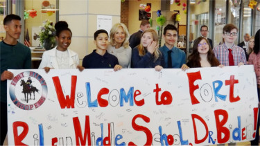 Fort Riley Middle School students pose with Dr. Jill Biden, the Second Lady of the United States, who visited Fort Riley Tuesday and Wednesday.