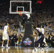 Villanova's Kris Jenkins (2) watches his game winning three point basket at the closing seconds of the NCAA Final Four tournament college basketball championship game against North Carolina, Monday, April 4, 2016, in Houston. Villanova won 77-74. (AP Photo/Kiichiro Sato)