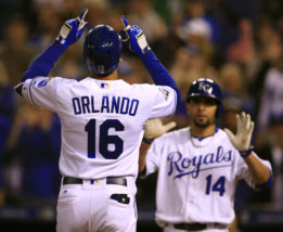 Kansas City Royals right fielder Paulo Orlando (16) celebrates following his two-run home run during the eighth inning of a baseball game against the Boston Red Sox at Kauffman Stadium in Kansas City, Mo., Tuesday, May 17, 2016. Orlando drove in Kansas City Royals' Omar Infante (14) on the play. (AP Photo/Orlin Wagner)