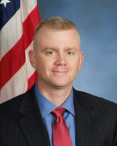 This undated image provided by the Kansas City Police Department shows Brad Lancaster. The police detective was fatally shot Monday, May 9, 2016, while investigating reports of a suspicious person near a racetrack in Kansas City, Kan. He died after undergoing surgery, his department said in a statement. (Kansas City Police Department via AP)