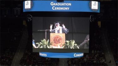 Manhattan High School Class of 2016 graduate Nathan McClendon delivers his address to classmates Sunday afternoon in Bramlage Coliseum. 