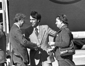 Kansas Governor-elect John Carlin, center, introduces President Jimmy Carter, left, to his wife Ramona, right, after Carter’s arrival in Kansas City on Nov. 9, 1978. President Carter held a news conference and addressed the Future Farmers of America convention. (AP Photo/John Filo)