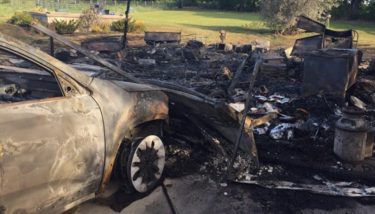 The aftermath of a garage fire that ignited after midnight Wednesday night. (Photos courtesy Kenia Mills/WIBW)